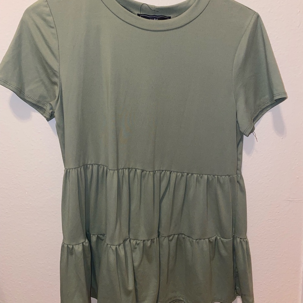 Green round neck top.